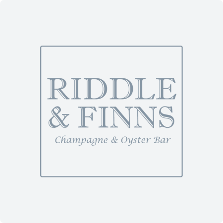 Riddle and Fins Planday Customer Case logo